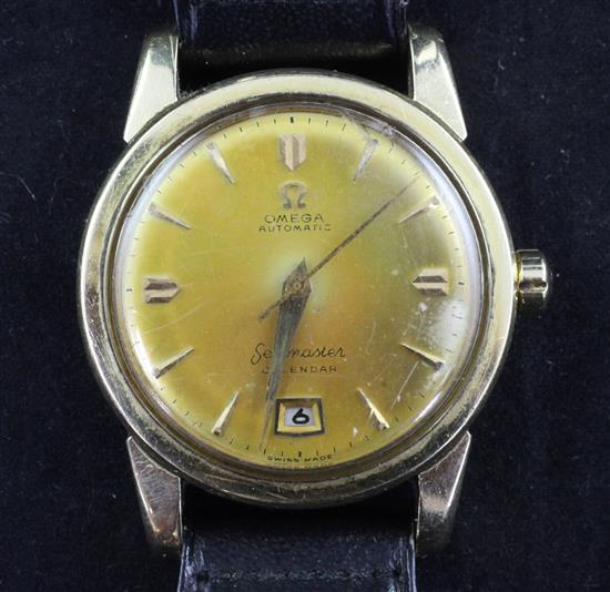 A gentlemans 1950s 14ct gold Omega Seamaster Calendar automatic wrist watch,